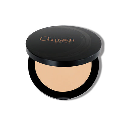 Pressed powder base natural light Osmosis Beauty Makeup opened compact on white background