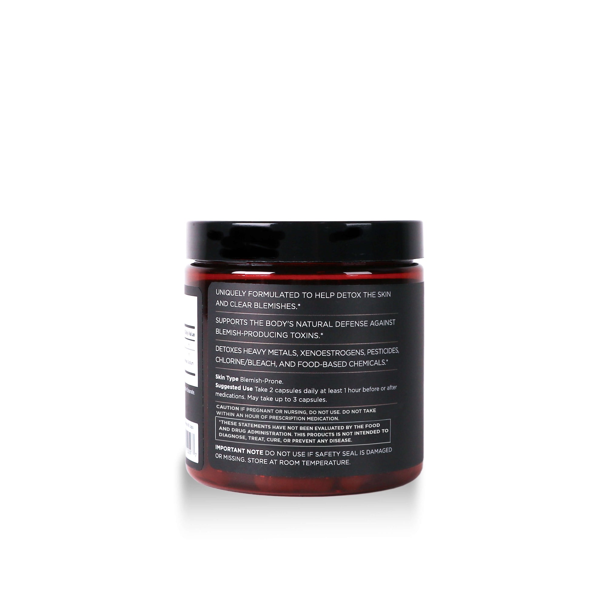 side view of skin defense capsules on white background